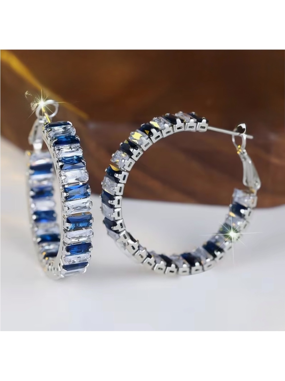 Silver Hoop Earrings with Blue and Clear Baguette Stones